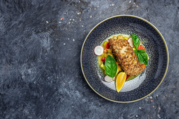 fish fillet breaded in nuts with pepper sauce and vegetables, Healthy fats, clean eating for weight...