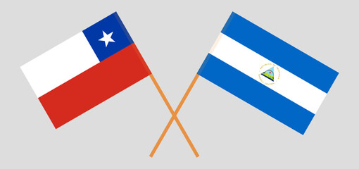 Crossed flags of Chile and Nicaragua. Official colors. Correct proportion