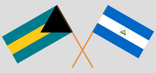 Crossed flags of the Bahamas and Nicaragua. Official colors. Correct proportion