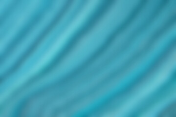 Blurred light blue and turquoise background with wavy curly pattern. Defocused art abstract gradient backdrop