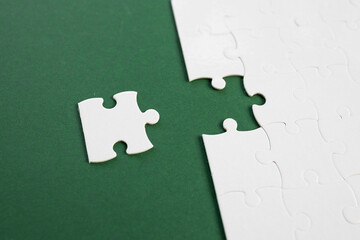 Empty white jigsaw puzzle with missing pieces