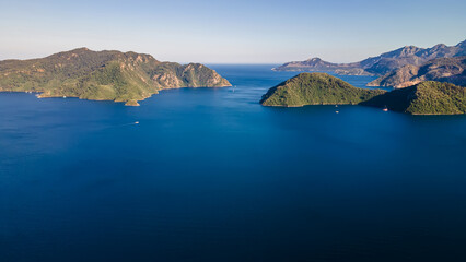 Fototapeta premium Beautiful evening sunset on the sea. Sea islands. Beautiful and colorful nature. Beautiful bays on the sea. Sea evening.