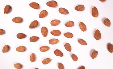 Almonds top view isolated on white background.