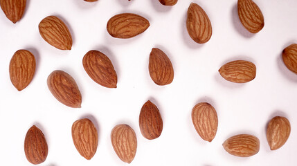 Almonds top view isolated on white background.