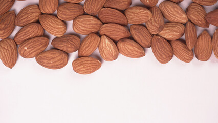 Almonds top view isolated on white background.