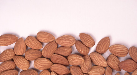 Almonds top view isolated on white background.