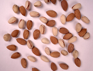 Almonds top view isolated on white background.