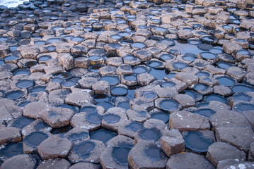 Honeycomb columns of the Giant's Causeway natural wonder located in County Antrim on the north...