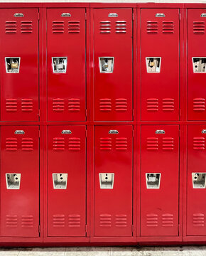 Wall of red lockers in workplace or school for storage