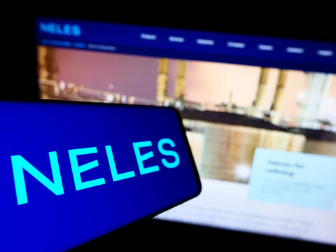 Stuttgart, Germany - 01-06-2022: Smartphone with logo of Finnish flow control company Neles Oyj on screen in front of business website. Focus on center-left of phone display.