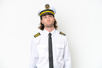 Fototapeta premium handsome Airplane pilot isolated on white background and looking up