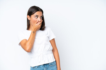 Young caucasian woman isolated on white background doing surprise gesture while looking to the side