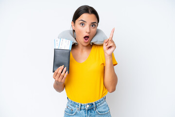 Woman with Inflatable Travel Pillow over isolated background intending to realizes the solution while lifting a finger up