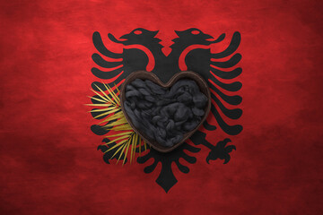 Wooden basket heart form on background of national flag. Photography and marketing digital backdrop. Albania