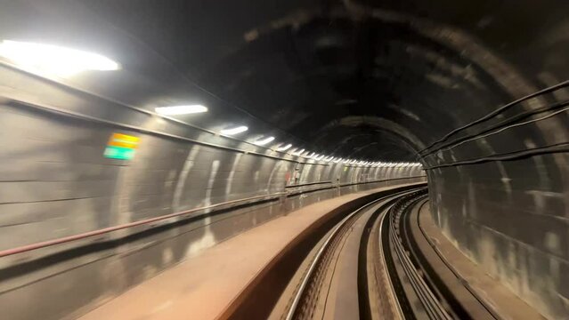 Time-lapse video of a trip in the Vancouver skytrain tunnel the tunnel is long and flickering all the forks are visible you can see everything inside. High quality 4k footage