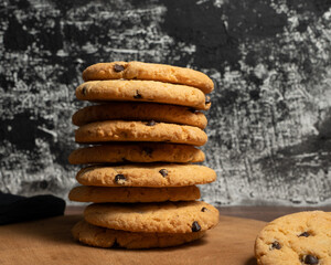 some cookies in stack on a wooden table