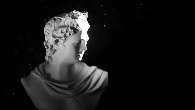 footage of sculpture dark background