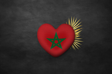 Textile heart in colors of national flag. Photography and marketing digital backdrop. Morocco