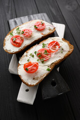 Toasts with microgreens on the table. Healthy food, vegan food and dieting concept.