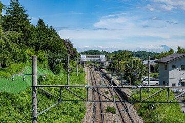 Fototapeta premium 富士山が見える田舎の駅