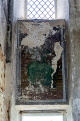 Frescoes on the wall of an abandoned Orthodox church