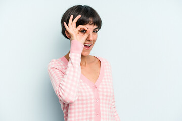 Young caucasian woman with a short hair cut isolated excited keeping ok gesture on eye.