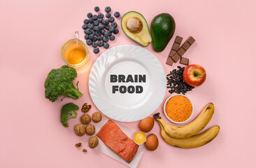 Best foods for brain and memory on pink background. Food for mind and charge of energy. Healthy...