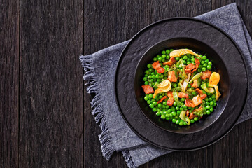 petits pois, french dish of garden green peas