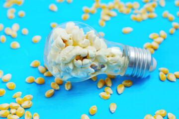 Incandescent lightbulb stuffed with popped corn