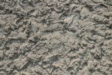 Old rough eroding cement surface as background