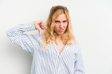 Young caucasian woman isolated on white background showing thumb down, disappointment concept.