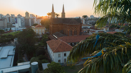 Fototapeta na wymiar drone landscape above one of the most visited places in uberaba, manoel terra square, seen with macaws 