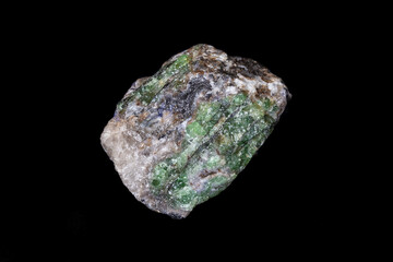 Green Tsavorite garnet, rough samples on host rock from Tanzania. Total specimen weight 142 grams....