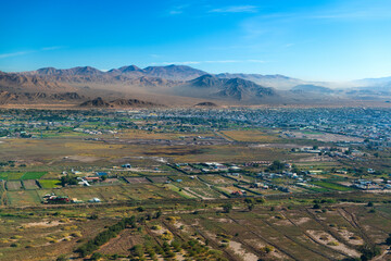 Aerial view of the mining city of Calama in northern Chile with Chuquicamata copper mine in the...