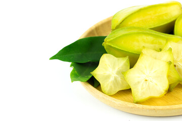 Fototapeta na wymiar Close up star fruit carambola or star apple ( starfruit ) on wood table background. Star fruit with healthy food.