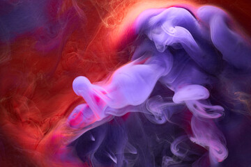 Fototapeta premium Blue red colorful smoke abstract background, acrylic paint underwater explosion
