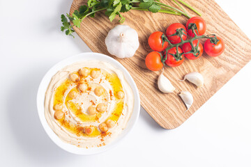 Delicious hummus with chickpeas, olive oil, lemon and pita bread. Vegetarian food concept. 
