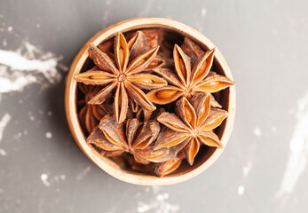 Anise in a wooden box Dried star anise spice fruits