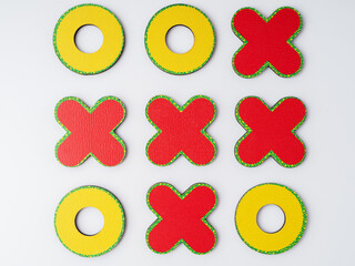 Board game tic-tac-toe. Tic Tac Toe game. Crosses win. View from above