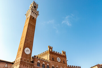 Obraz premium Exterior of the city hall (in italian: Palazzo Comunale or Palazzo Pubblico) in Siena, Tuscany, Italy, Europe
