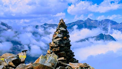 Pila de piedras en el la cima del pico de Cataperdís - obrazy, fototapety, plakaty