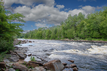 Waterfalls on a beautiful wild river in Quebec in Canada