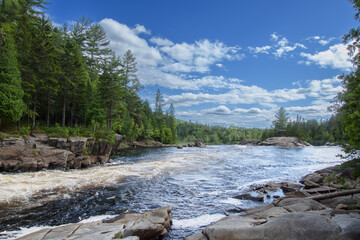 Waterfalls on a beautiful wild river in Quebec in Canada