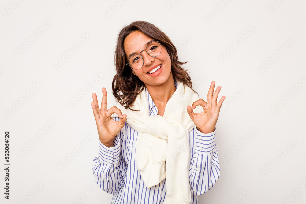 Canvas Prints Young hispanic woman isolated on white background cheerful and confident showing ok gesture.