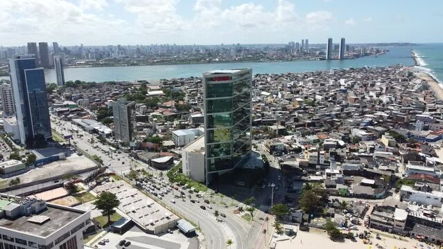 Vista panor&acirc;mica a&eacute;rea do pr&eacute;dio JCPM no bairro do Pina, Recife Pernambuco com vista do centro da cidade ao fundo