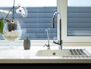 Kitchen sink with faucet