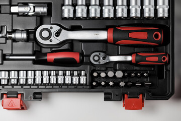 Spanners of various sizes with various hex sockets in a black box