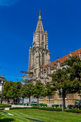 Fototapeta na wymiar BERN, SWITZERLAND - August 2nd 2022: Bern, Switzerland. Spire Bernese Cathedral (Berner Münster).