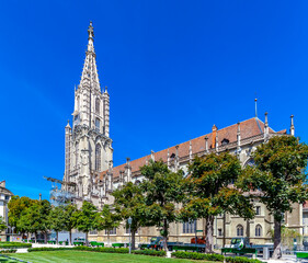 BERN, SWITZERLAND - August 2nd 2022: Spire Bernese Cathedral (Berner Münster). View from the Münsterplatform.