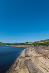 Baitings Reservoir near Ripponden, West Yorkshire, part of Yorkshire Water's series of reservoirs. Drought conditions across England causing depleted water levels.